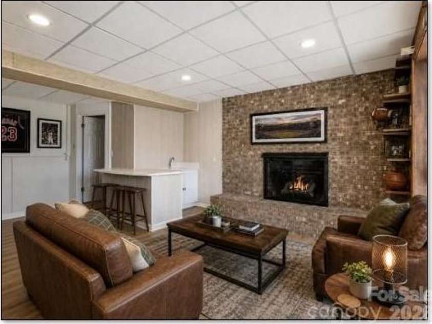 3113 Primrose Drive, Hendersonville, NC 28792.  MLS# CAR4359967, YatesRealty ID 13099. Virtually staged lower level den