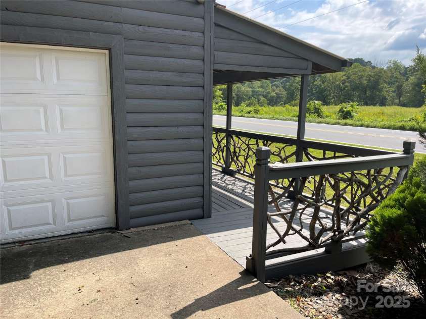 1961 Cane Creek Road, Fletcher, NC 28732.  MLS# CAR4233282, YatesRealty ID 131. Handicapped accessible from concrete pad.