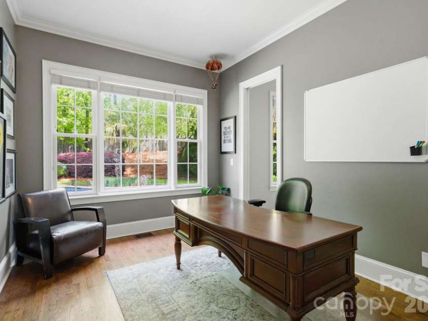 7004 Camrose Crossing Lane, Matthews, NC 28104.  MLS# CAR4367901, YatesRealty ID 13108. Primary Suite Luxe Study