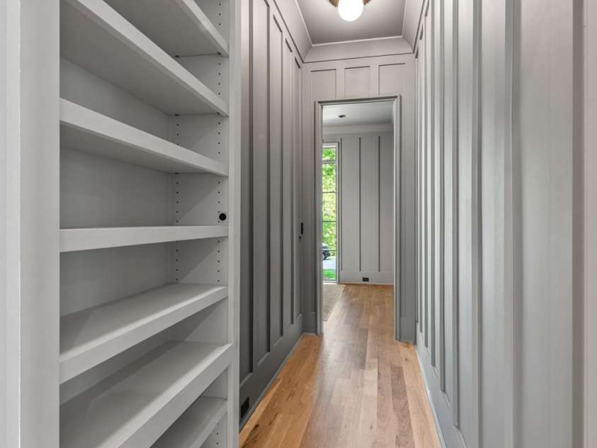 5601 Robinhood Road, Charlotte, NC 28211.  MLS# CAR4258800, YatesRealty ID 13109. Hidden bookcase door leads to the tucked away office