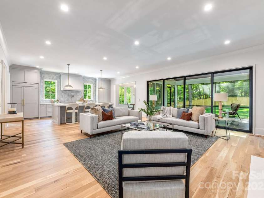 5601 Robinhood Road, Charlotte, NC 28211.  MLS# CAR4258800, YatesRealty ID 13109. Looking into the Great Room from the entrance to the Primary Suite and Office