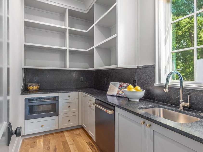 5601 Robinhood Road, Charlotte, NC 28211.  MLS# CAR4258800, YatesRealty ID 13109. Pantry with microwave and additional dishwasher