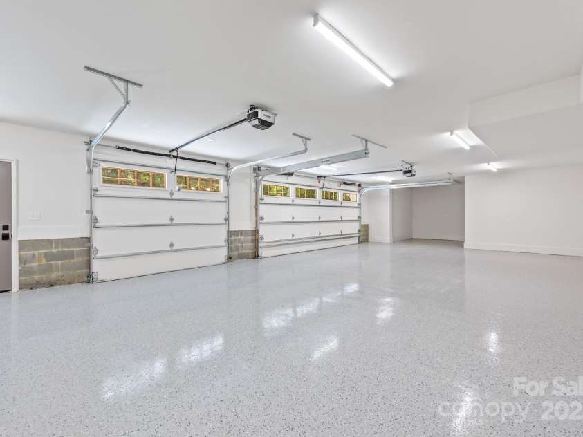 5601 Robinhood Road, Charlotte, NC 28211.  MLS# CAR4258800, YatesRealty ID 13109. Spacious 3 car garage with additional storage