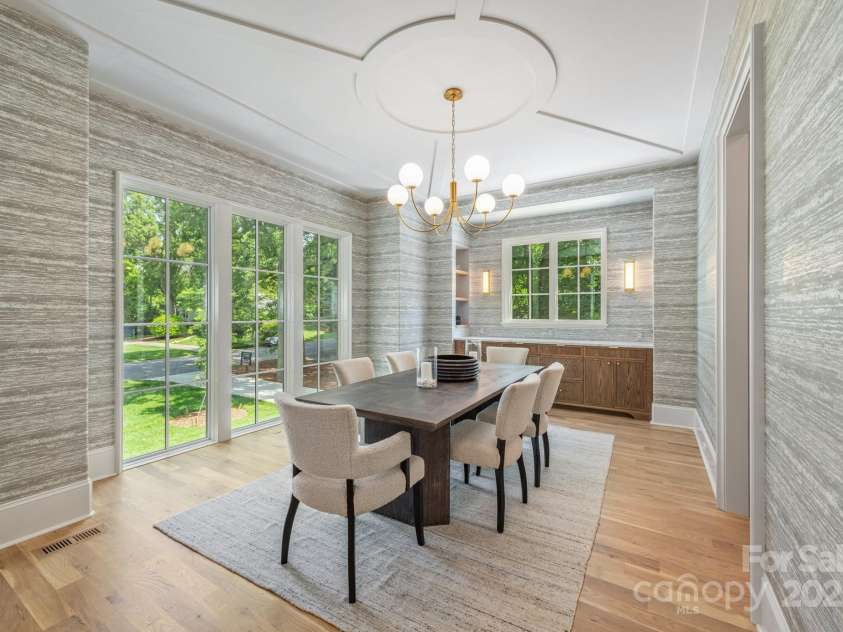 5601 Robinhood Road, Charlotte, NC 28211.  MLS# CAR4258800, YatesRealty ID 13109. Sun drenched Dining Room with built-ins and incredible details