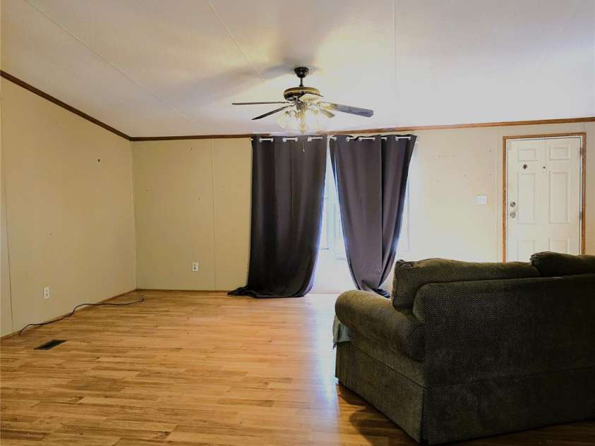 219 Watterson Road, Grover, NC 28073.  MLS# CAR4259268, YatesRealty ID 13116. Dining area looking into livingroom