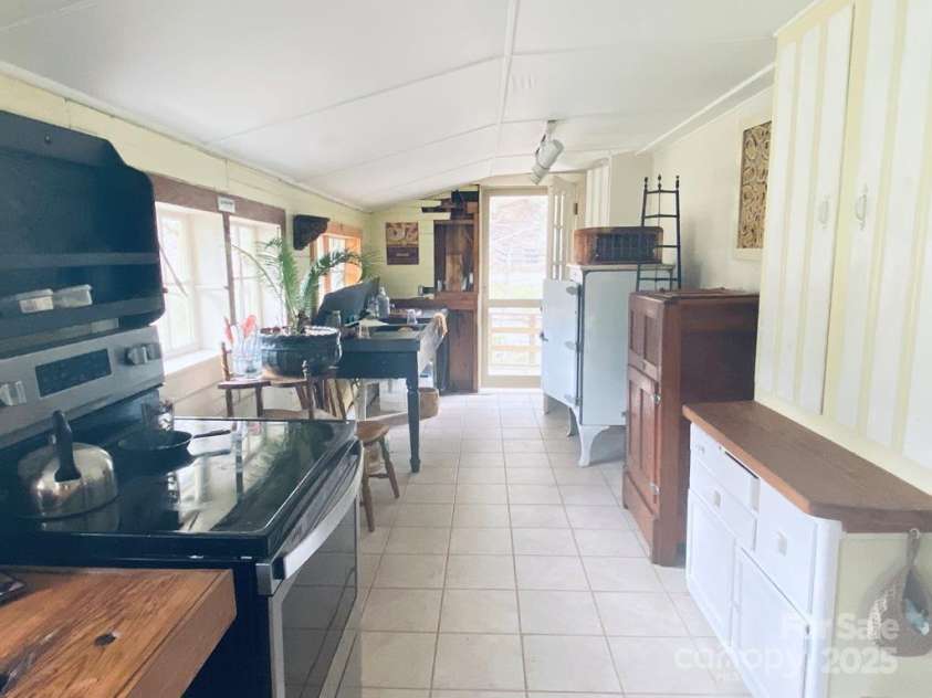 5933 Norton Road, Cullowhee, NC 28723.  MLS# CAR4259736, YatesRealty ID 13117. 