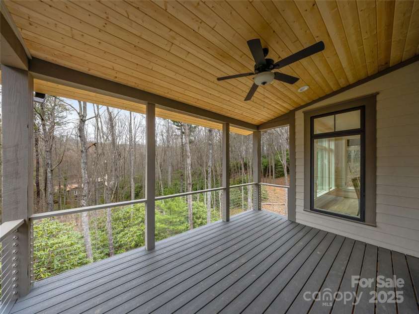 435 Barrington Drive, Asheville, NC 28803.  MLS# CAR4235274, YatesRealty ID 13124. Main level covered porch
