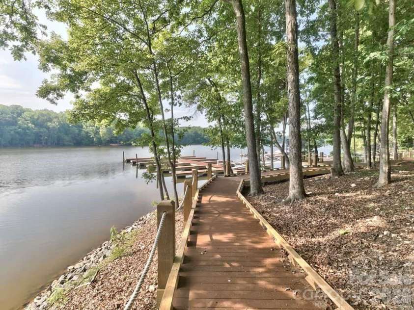 8238 Merryvale Lane, Charlotte, NC 28214.  MLS# CAR4350483, YatesRealty ID 13125. 10 miles of walking & nature trails