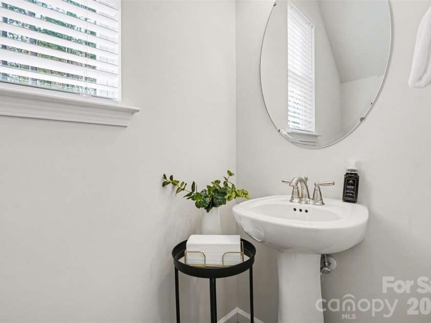 8238 Merryvale Lane, Charlotte, NC 28214.  MLS# CAR4350483, YatesRealty ID 13125. 1/2 bath downstairs