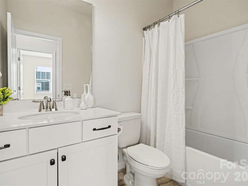 8238 Merryvale Lane, Charlotte, NC 28214.  MLS# CAR4350483, YatesRealty ID 13125. Guest Bath upstairs