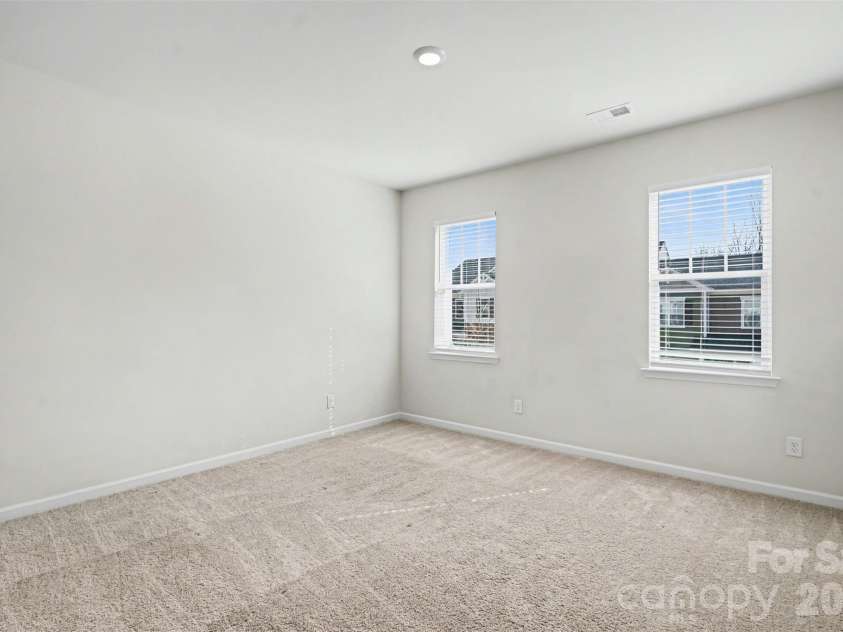 8238 Merryvale Lane, Charlotte, NC 28214.  MLS# CAR4350483, YatesRealty ID 13125. Guest bedroom upstairs (with walk-in in closet)