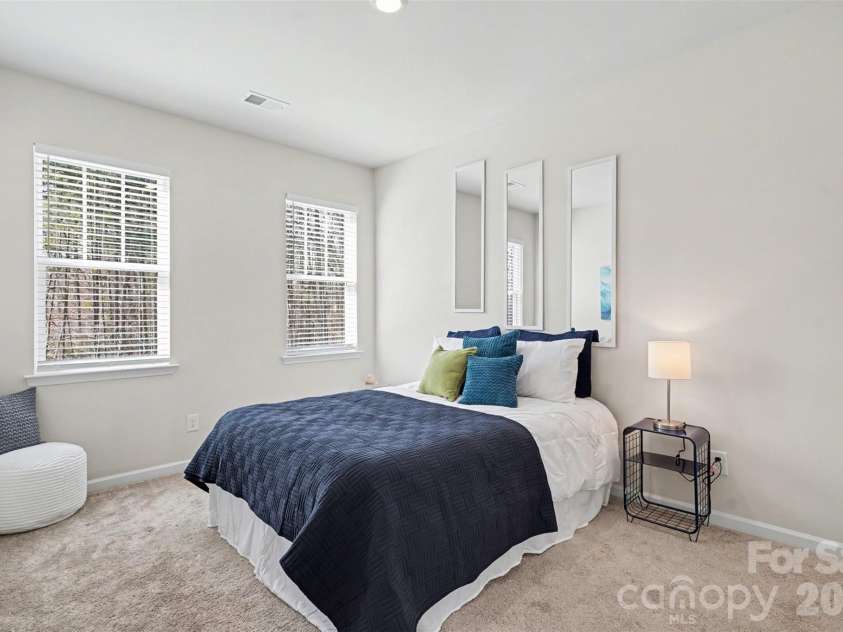 8238 Merryvale Lane, Charlotte, NC 28214.  MLS# CAR4350483, YatesRealty ID 13125. Guest Bedroom upstairs (with walk-in in closet and attic access)