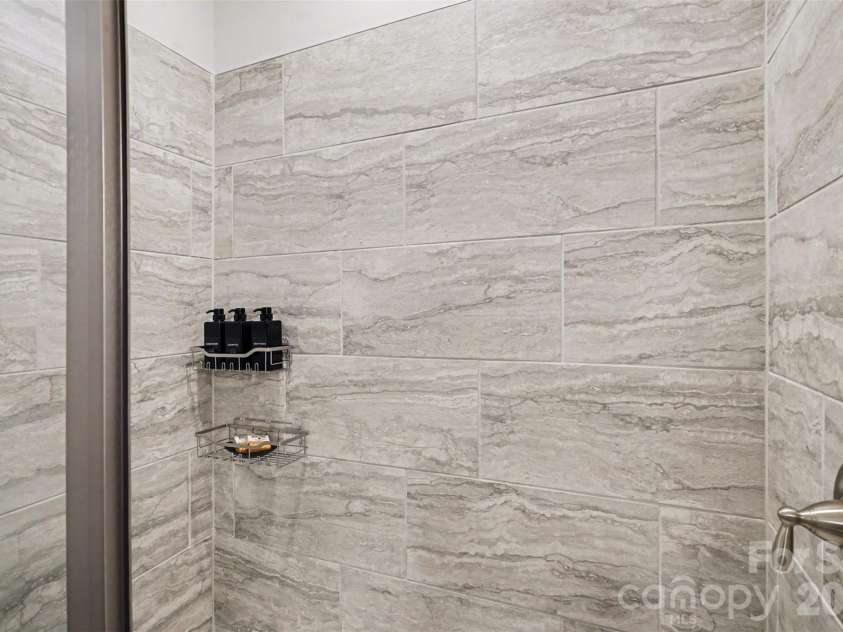8238 Merryvale Lane, Charlotte, NC 28214.  MLS# CAR4350483, YatesRealty ID 13125. Primary bath with standing shower
