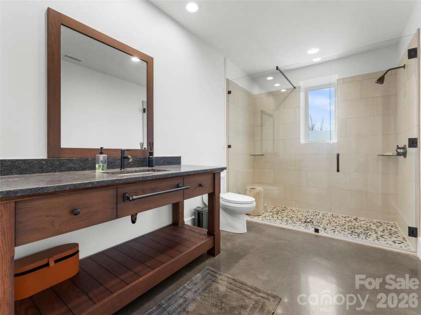 208 Skycliff Drive, Asheville, NC 28804.  MLS# CAR4359719, YatesRealty ID 13129. Ensuite Bath downstairs