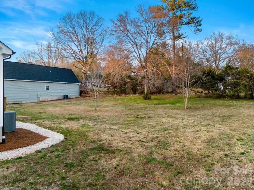1235 Branch Street, Lancaster, SC 29720.  MLS# CAR4349903, YatesRealty ID 13134. LARGE, LEVEL YARD