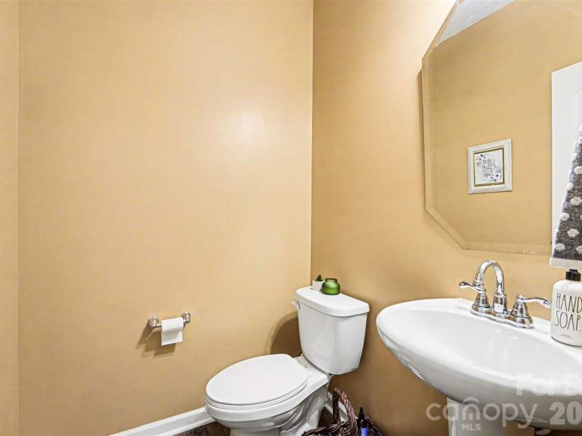 705 Wilshire Drive, Albemarle, NC 28001.  MLS# CAR4351237, YatesRealty ID 13136. Half Bath