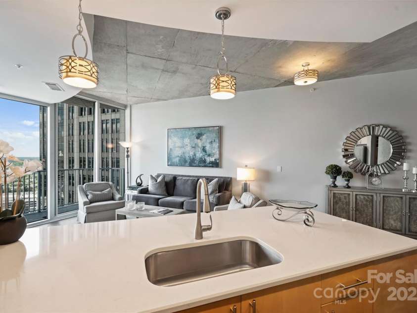 210 Church Street, Charlotte, NC 28202.  MLS# CAR4254825, YatesRealty ID 1314. Custom lighting throughout 