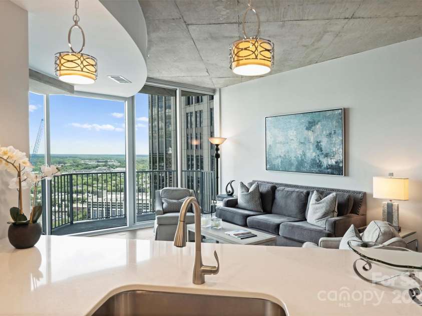 210 Church Street, Charlotte, NC 28202.  MLS# CAR4254825, YatesRealty ID 1314. Enjoy the views while prepping in the kitchen