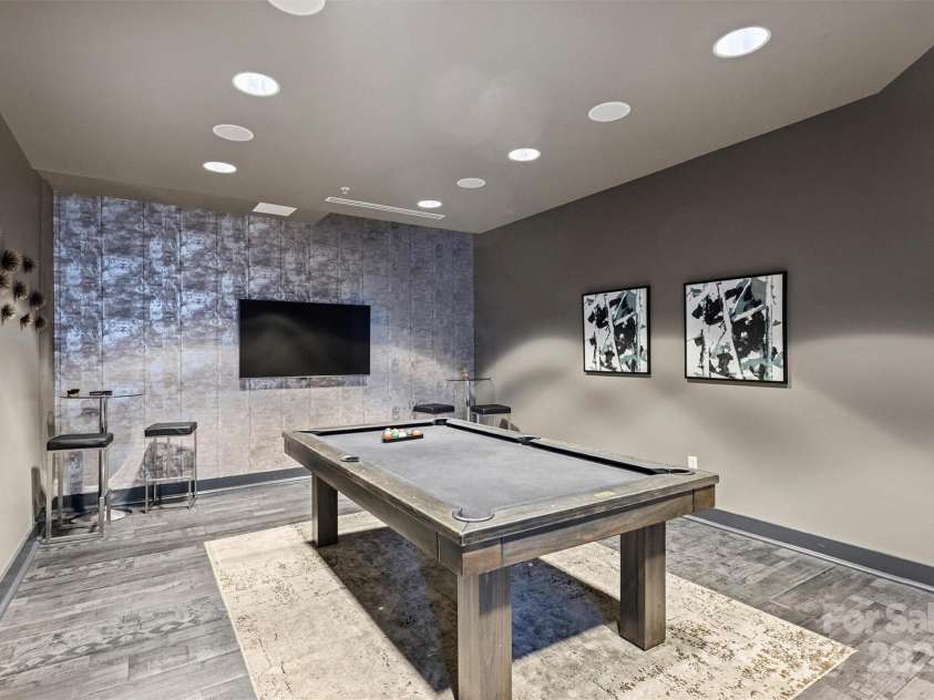 210 Church Street, Charlotte, NC 28202.  MLS# CAR4254825, YatesRealty ID 1314. Owner's Pool Table -10th floor 