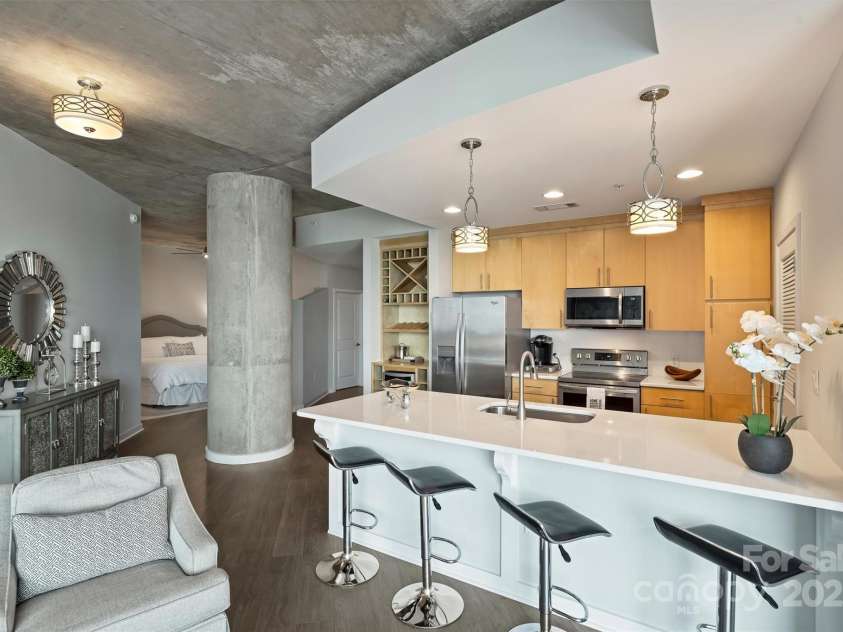 210 Church Street, Charlotte, NC 28202.  MLS# CAR4254825, YatesRealty ID 1314. Updated Countertops with extended island 