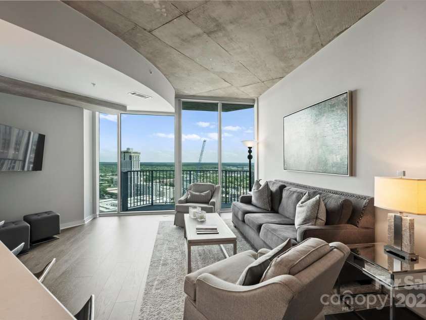 210 Church Street, Charlotte, NC 28202.  MLS# CAR4254825, YatesRealty ID 1314. Views from living room 