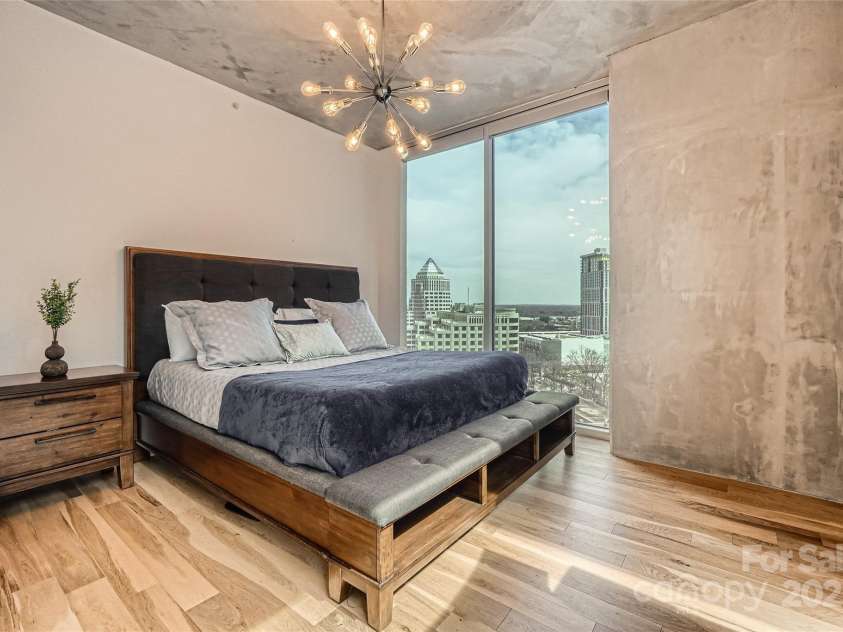 210 Church Street, Charlotte, NC 28202.  MLS# CAR4308241, YatesRealty ID 1314. Incredible views of the city - sleek automated blinds