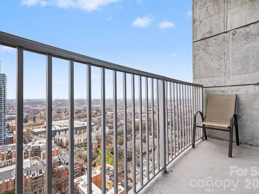 210 Church Street, Charlotte, NC 28202.  MLS# CAR4340266, YatesRealty ID 1314. Balcony off bedroom