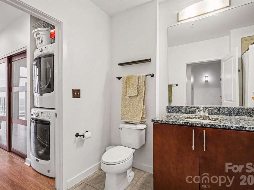 210 Church Street, Charlotte, NC 28202.  MLS# CAR4340266, YatesRealty ID 1314. Bathroom & Laundry