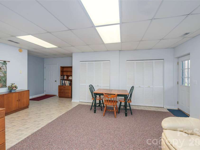 57 Gloria Way, Waynesville, NC 28785.  MLS# CAR4358759, YatesRealty ID 13141. Finished basement