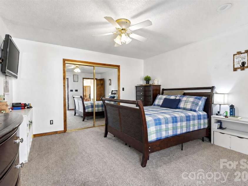 20 Annie Drive, Marion, NC 28752.  MLS# CAR4357661, YatesRealty ID 13142. Virtually Staged Bedding