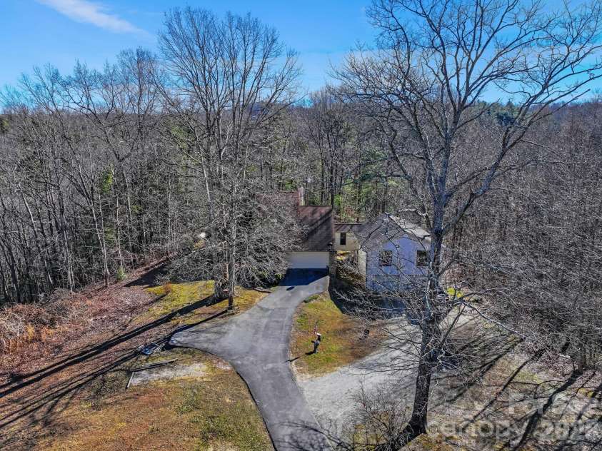 40 Country Bear Lane, Flat Rock, NC 28731.  MLS# CAR4332498, YatesRealty ID 13148. Ample parking - very private