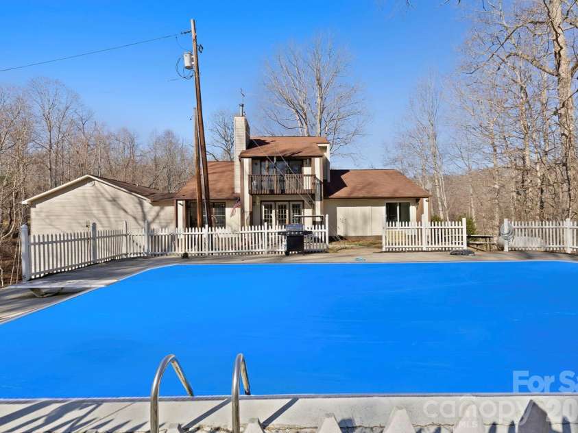 40 Country Bear Lane, Flat Rock, NC 28731.  MLS# CAR4332498, YatesRealty ID 13148. Large Pool - cover is placed virtually