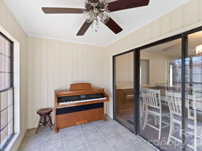 40 Country Bear Lane, Flat Rock, NC 28731.  MLS# CAR4332498, YatesRealty ID 13148. Sunroom #1