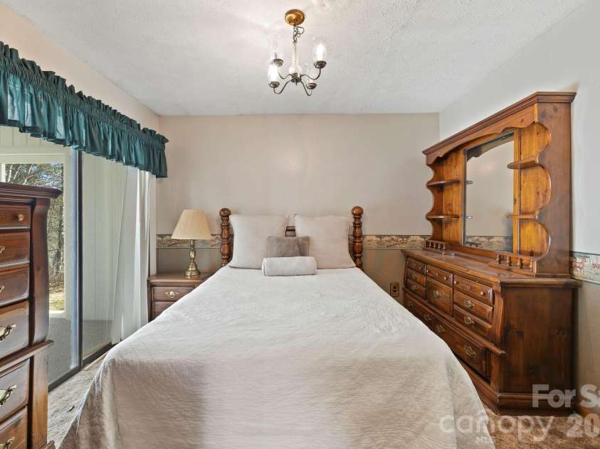 40 Country Bear Lane, Flat Rock, NC 28731.  MLS# CAR4332498, YatesRealty ID 13148. Unit 1 - 2nd Bedroom