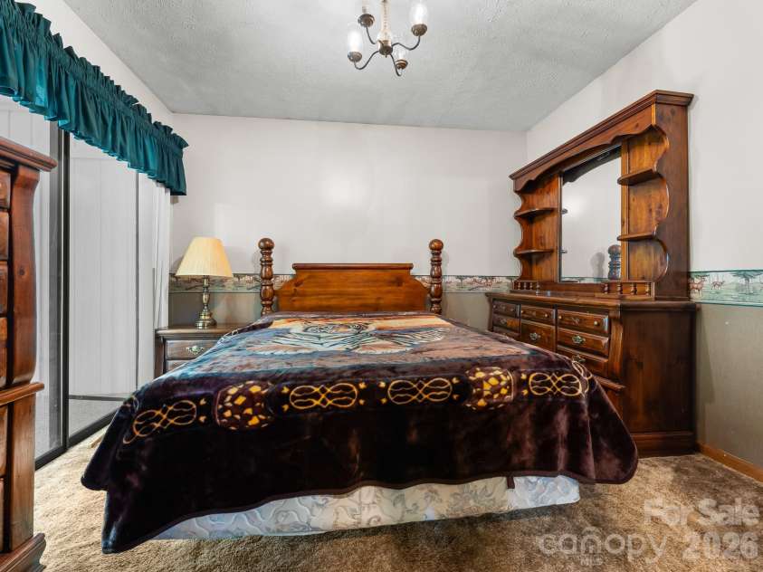40 Country Bear Lane, Flat Rock, NC 28731.  MLS# CAR4420837, YatesRealty ID 13148. Bedroom 2 on main