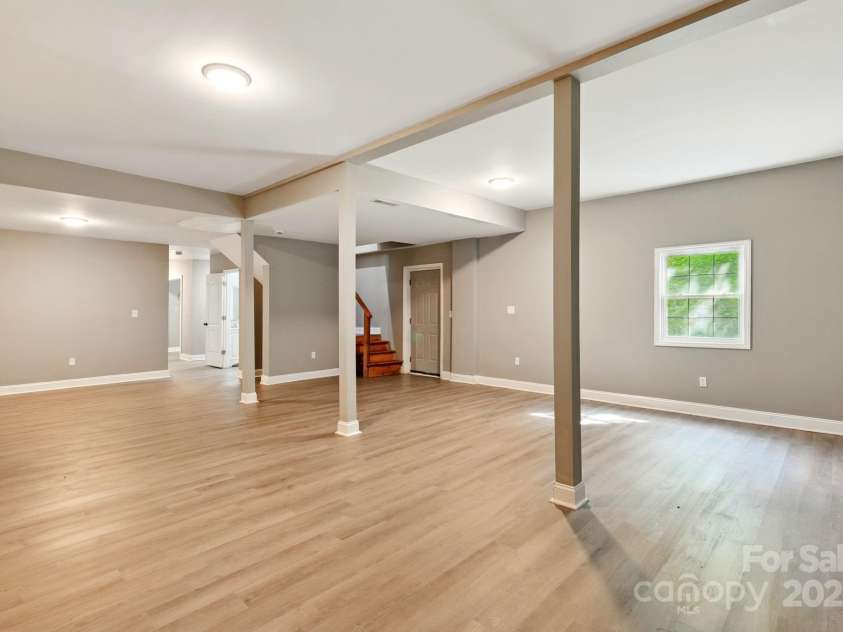 131 Little Forest Lane, Statesville, NC 28625.  MLS# CAR4252416, YatesRealty ID 13159. Basement Rec Room