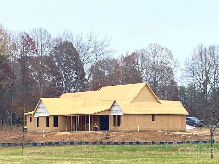 123 Buffalo Creek Drive, Statesville, NC 28677.  MLS# CAR4316853, YatesRealty ID 1316. Rearview - updated pic on Nov 21st.  On schedule for March completion date