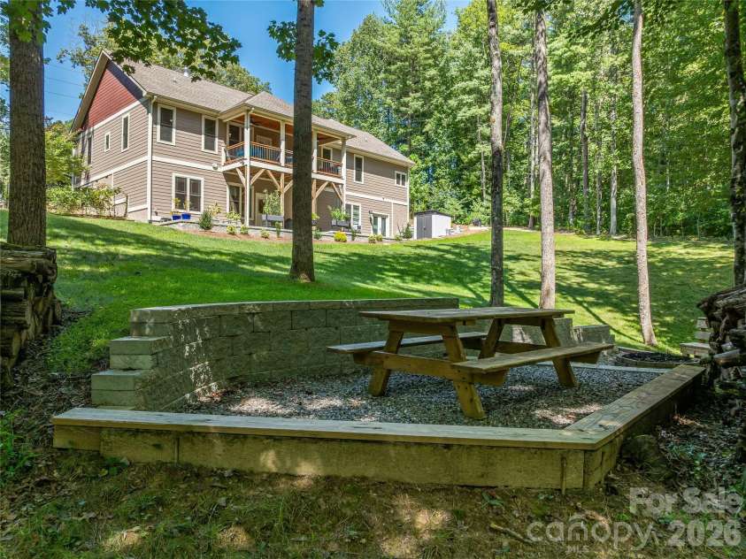 937 Monte Vista Road, Candler, NC 28715.  MLS# CAR4368925, YatesRealty ID 13160. Additional retaining wall added for lower firepit area