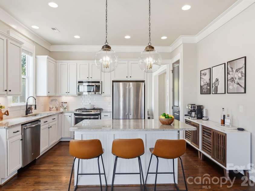 724 Bluff Loop Road, Rock Hill, SC 29730.  MLS# CAR4368937, YatesRealty ID 13163. Kitchen island perfect for breakfast and meal prep.