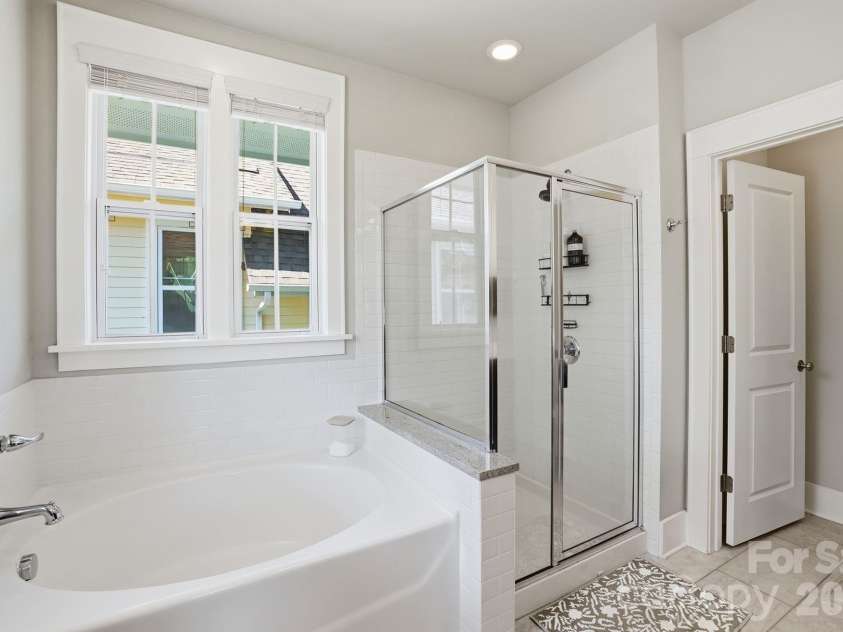 724 Bluff Loop Road, Rock Hill, SC 29730.  MLS# CAR4368937, YatesRealty ID 13163. Primary bath with garden tub