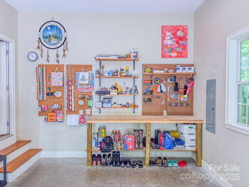 262 Erwin Hills Road, Asheville, NC 28806.  MLS# CAR4255578, YatesRealty ID 13166. Built in work bench