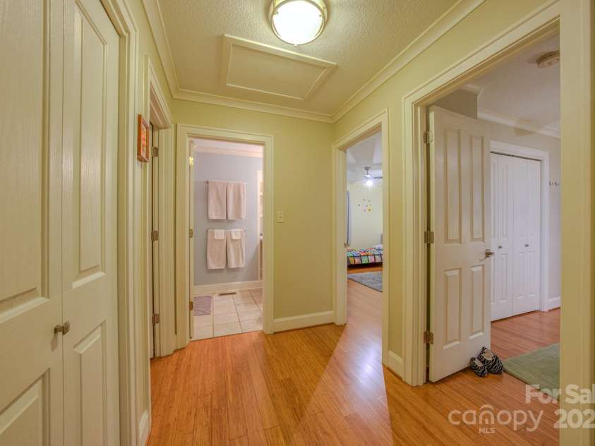 262 Erwin Hills Road, Asheville, NC 28806.  MLS# CAR4255578, YatesRealty ID 13166. Hall way with attic access