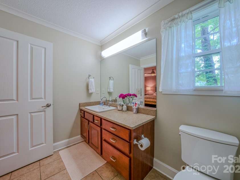 262 Erwin Hills Road, Asheville, NC 28806.  MLS# CAR4255578, YatesRealty ID 13166. Primary bathroom
