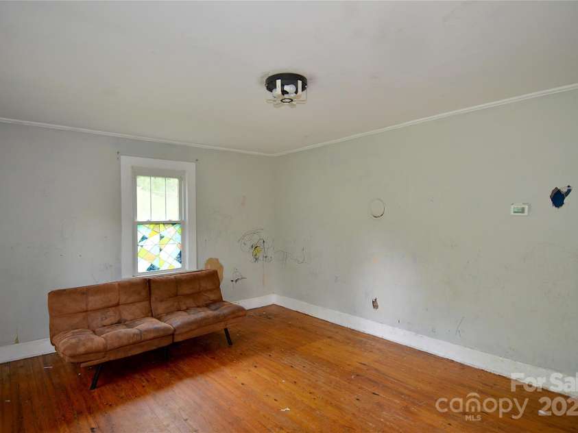 447 Harmony Grove Road, Nebo, NC 28761.  MLS# CAR4253632, YatesRealty ID 13167. Living room