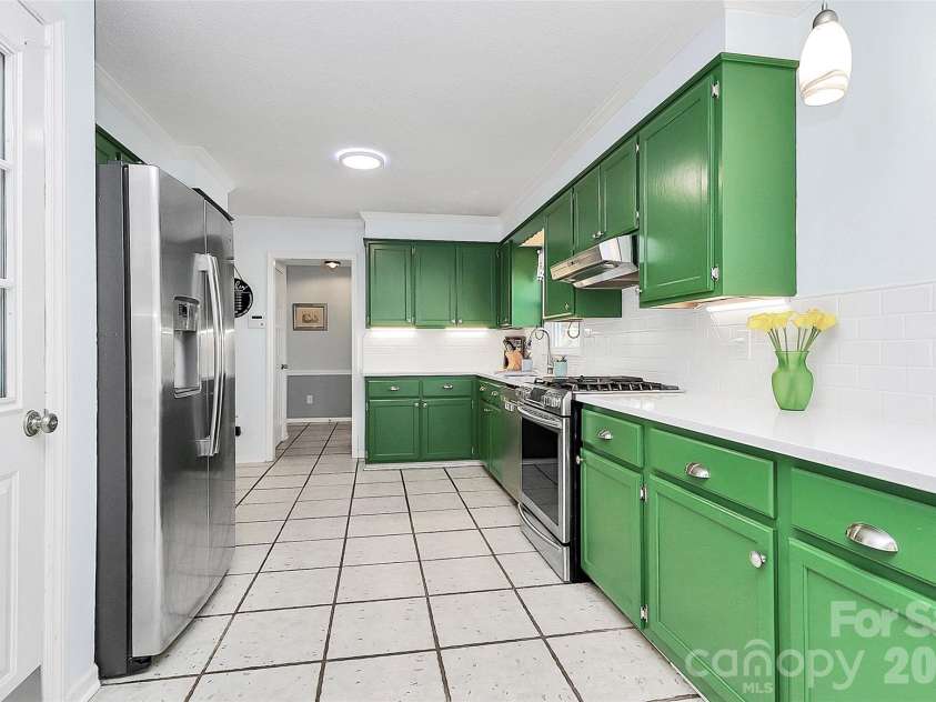 1148 Blossom Terrace, Fort Mill, SC 29715.  MLS# CAR4340952, YatesRealty ID 13169. Abundant Cabinets, Generous Counters
