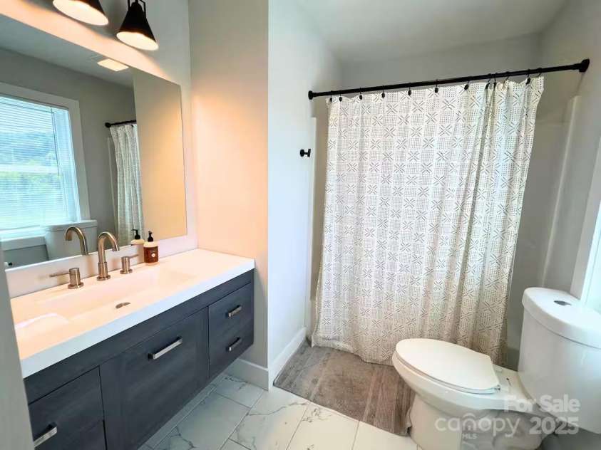 1057 Riverside Drive, Asheville, NC 28804.  MLS# CAR4330741, YatesRealty ID 13179. 