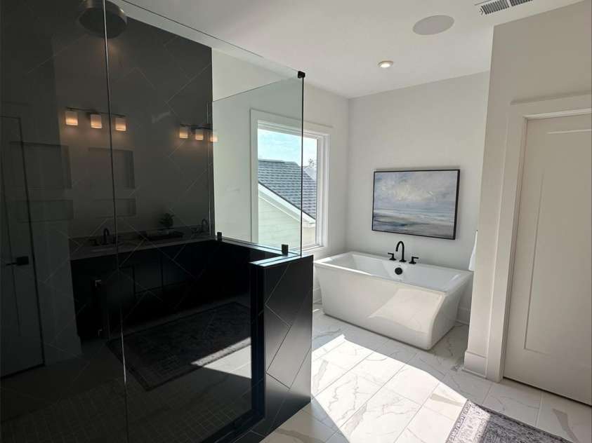 5225 Glenwalk Drive, Charlotte, NC 28269.  MLS# CAR4166267, YatesRealty ID 13180. Primary Bath Luxury Shower with rainhead and body sprays on digital control