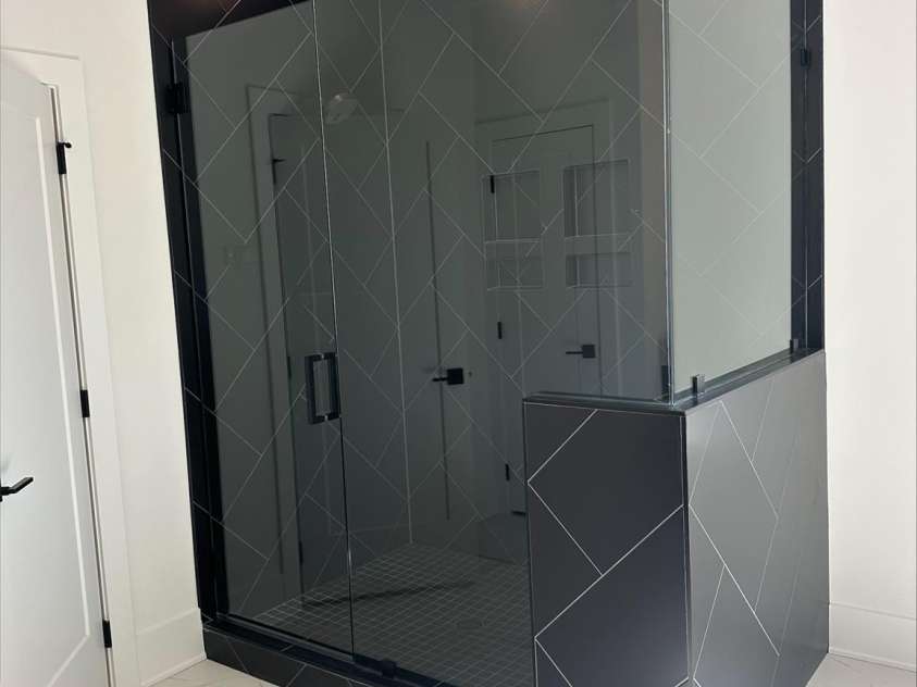 5225 Glenwalk Drive, Charlotte, NC 28269.  MLS# CAR4166267, YatesRealty ID 13180. Primary Bath Luxury Shower with rainhead and body sprays on digital control