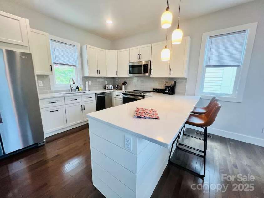 1061 Riverside Drive, Asheville, NC 28804.  MLS# CAR4330744, YatesRealty ID 13181. 
