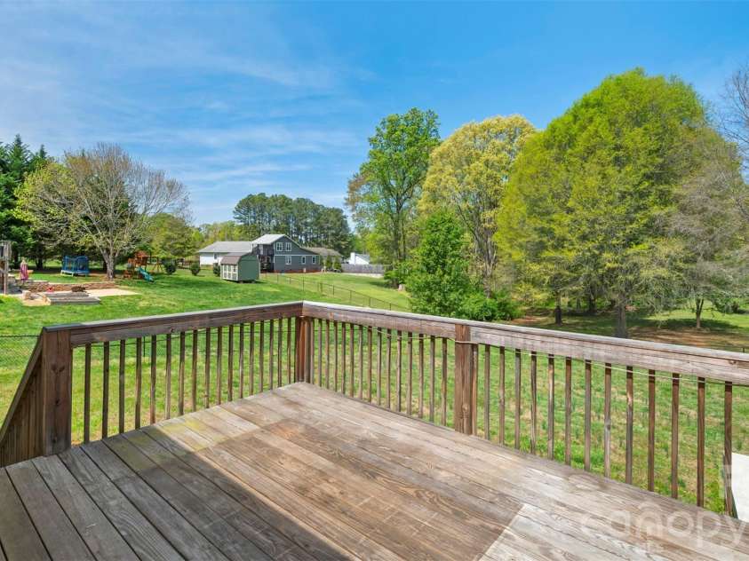 1880 Chestnut Grove Road, King, NC 27021.  MLS# CAR4371431, YatesRealty ID 13192. Back deck 